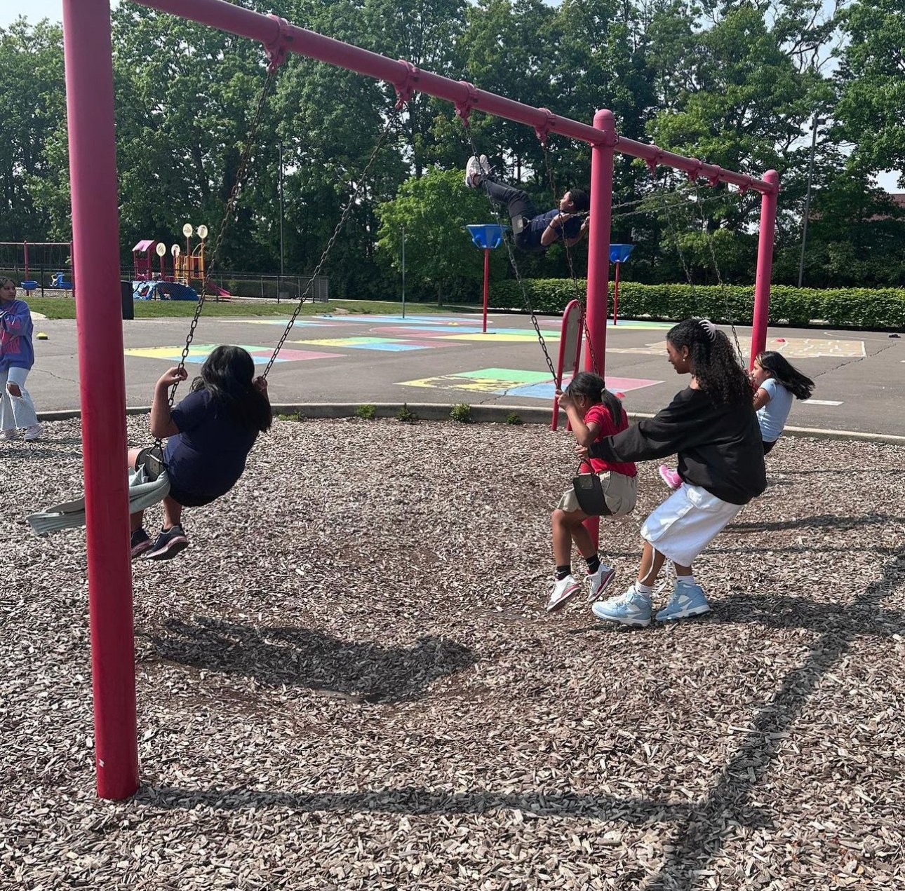 Kids on the swings at recess