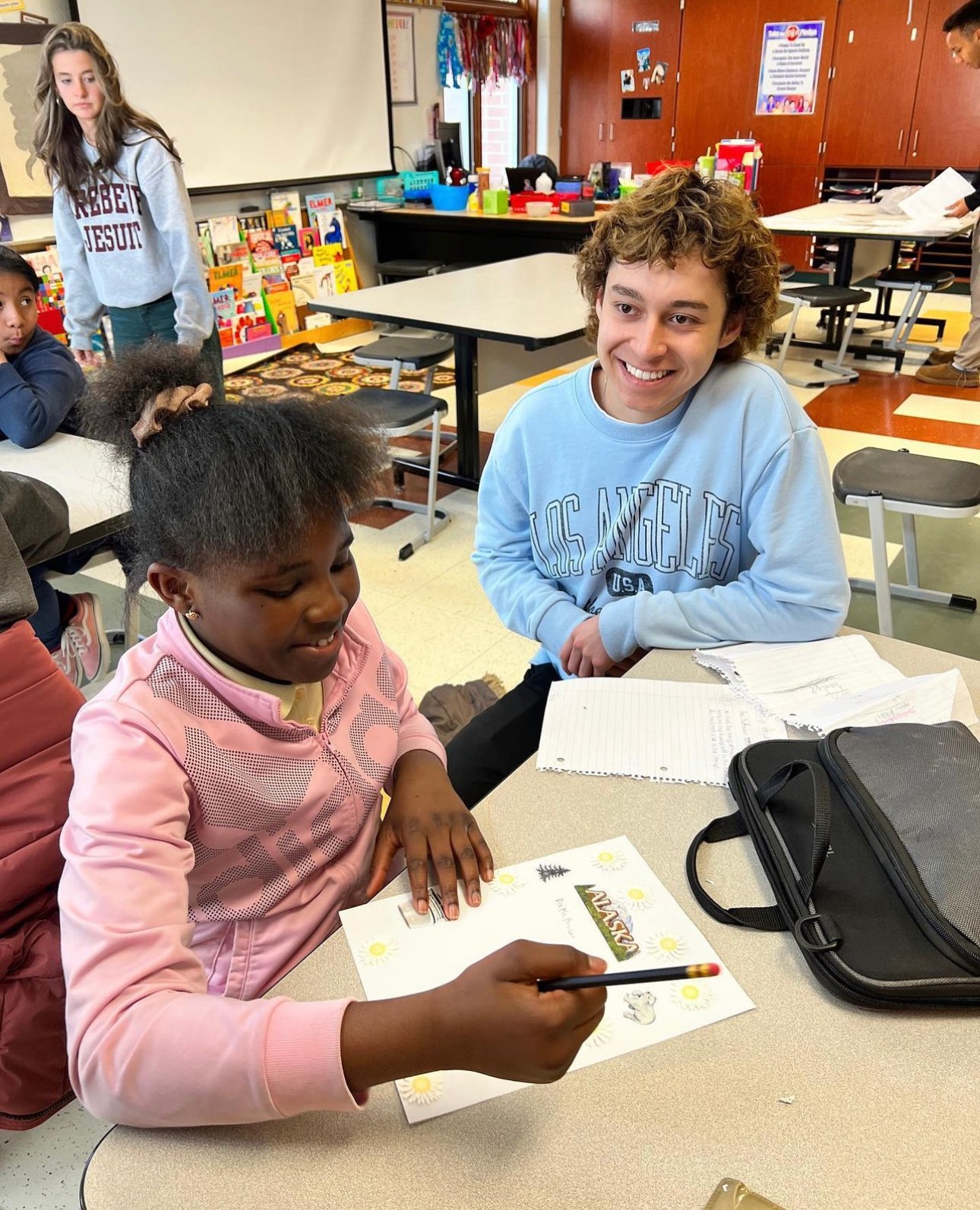 A tutor helping a student one-on-one